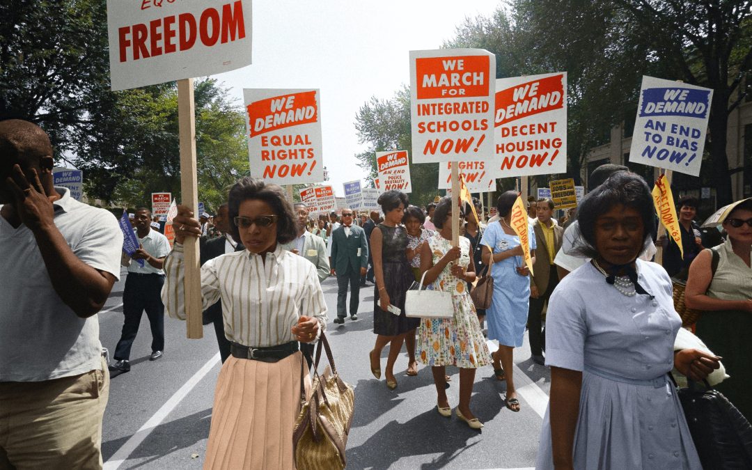 A group of Black people exercises their civil rights.